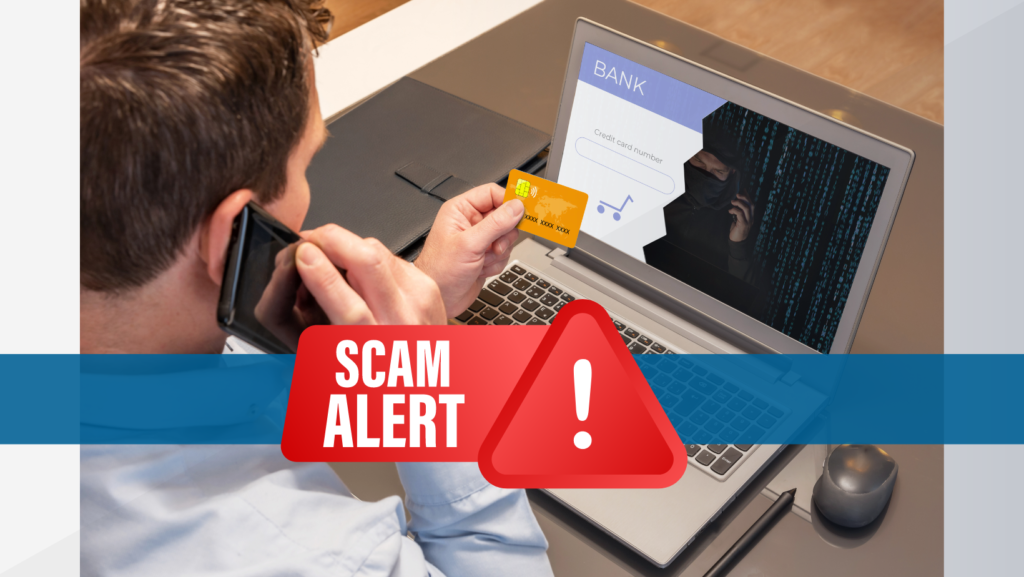 man on phone with credit card out and laptop featuring bank account, overlaid with Scam Alert warning on image